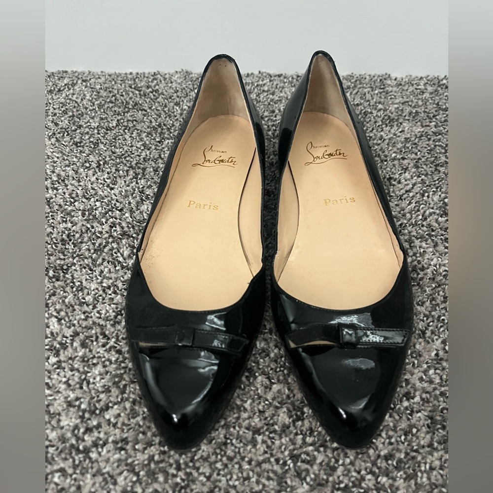 Christian Louboutin
Mamadrague Patent Bow Red Sole Ballerina